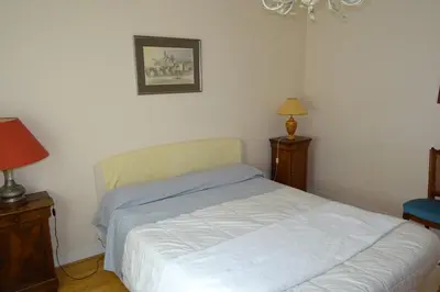 Un ou plusieurs lits dans un hébergement de l'établissement Chambres d'Hôtes à la Fontanille