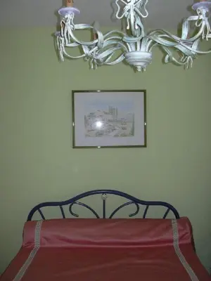 Un ou plusieurs lits dans un hébergement de l'établissement Chambres d'Hôtes à la Fontanille