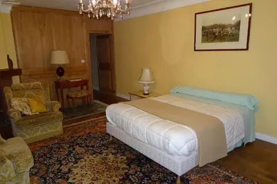 Un ou plusieurs lits dans un hébergement de l'établissement Chambres d'Hôtes à la Fontanille
