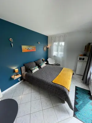 Un ou plusieurs lits dans un hébergement de l'établissement Chambre calme avec piscine - L'Echappée Belle