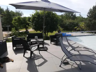 Piscine de l'établissement Chambre calme avec piscine - L'Echappée Belle ou située à proximité