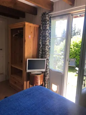 Un ou plusieurs lits dans un hébergement de l'établissement chambres d'hôtes du puy blanc