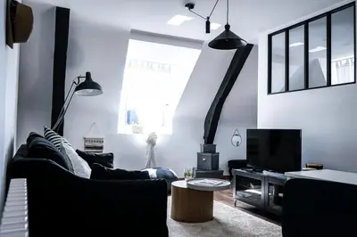 Coin salon dans l'établissement La Cachette d Artistes - 1 Chambre