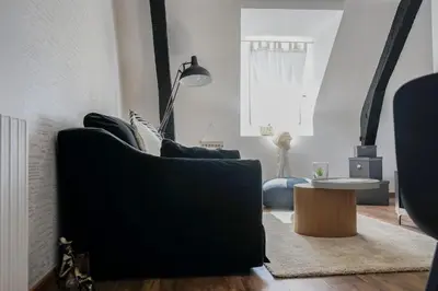 Coin salon dans l'établissement La Cachette d Artistes - 1 Chambre