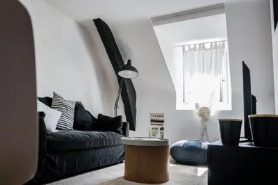 Coin salon dans l'établissement La Cachette d Artistes - 1 Chambre