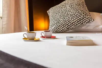 Un ou plusieurs lits dans un hébergement de l'établissement Le Studio Reynal - 1 Chambre