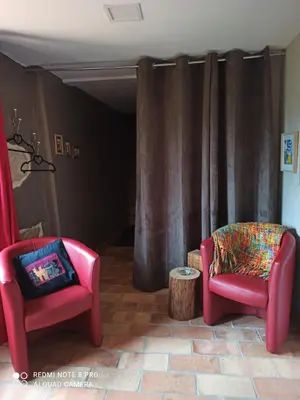 Coin salon dans l'établissement Les Granges De Cassard