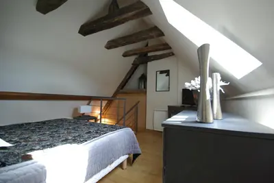 Un ou plusieurs lits dans un hébergement de l'établissement Logis Hotel Le Relais du Quercy