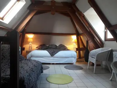 Un ou plusieurs lits dans un hébergement de l'établissement Logis Hotel Le Relais du Quercy