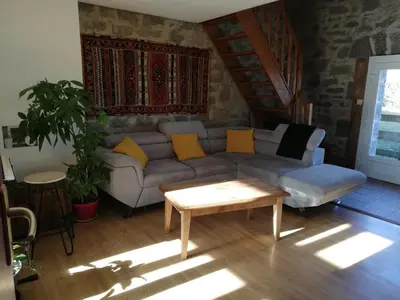 Coin salon dans l'établissement La Maison Bleue23