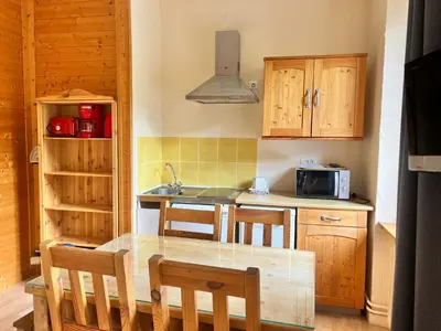 Cuisine ou kitchenette dans l'établissement Résidence Les Dômes