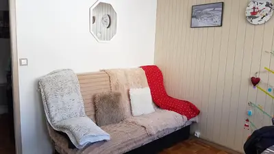 Coin salon dans l'établissement Studio-cabine au pied des pistes à Super Besse