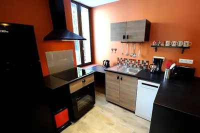Cuisine ou kitchenette dans l'établissement Appartement Charlannes