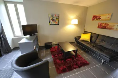 Coin salon dans l'établissement Appartement Grande terrasse