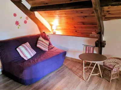 Coin salon dans l'établissement Holiday Home Sarrouil by Interhome