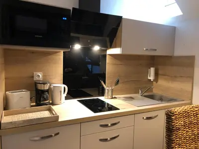 Cuisine ou kitchenette dans l'établissement Les Maisons du Périgord