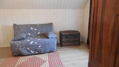 Coin salon dans l'établissement GITE AMOUROUX