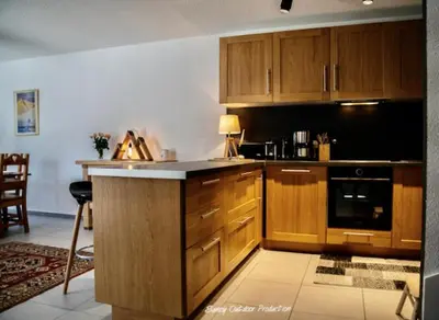 Cuisine ou kitchenette dans l'établissement Villa les Dahlias