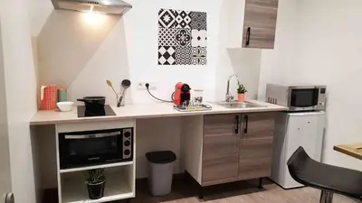 Cuisine ou kitchenette dans l'établissement Appart Confortable à Tulle - Bien situé - Calme
