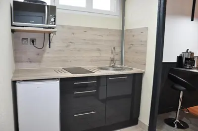 Cuisine ou kitchenette dans l'établissement studio vic 2.0