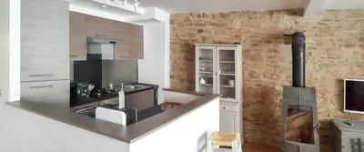 Cuisine ou kitchenette dans l'établissement Maison charmante à La Porcherie