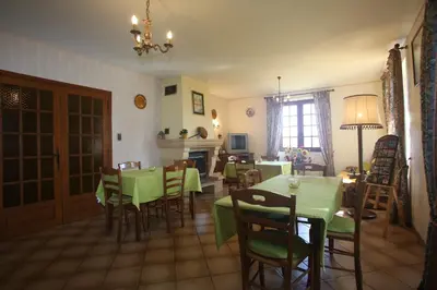 Coin salon dans l'établissement Chambres d'Hôtes Larnaudie