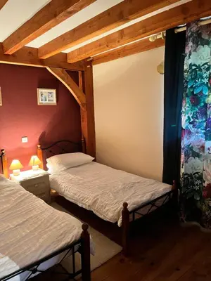 Un ou plusieurs lits dans un hébergement de l'établissement Chez Jallot - Upper Gite