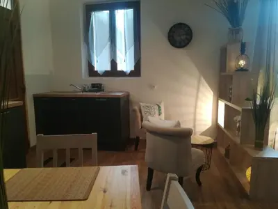 Coin salon dans l'établissement L'Appart Montignac Lascaux