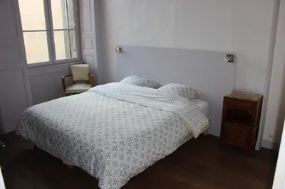 Un ou plusieurs lits dans un hébergement de l'établissement La Rapiette de Noblat