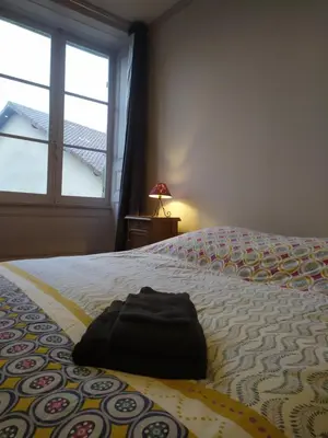 Un ou plusieurs lits dans un hébergement de l'établissement La Rapiette de Noblat