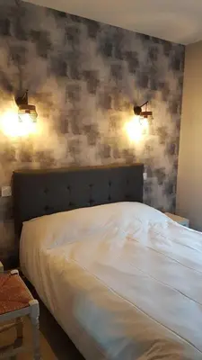 Un ou plusieurs lits dans un hébergement de l'établissement Le Castel du Cantal Groupe Village Fani