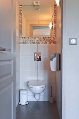 Salle de bains dans l'établissement Logis Hôtel Restaurant & Spa les Remparts