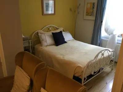 Un ou plusieurs lits dans un hébergement de l'établissement Auberge Henri IV