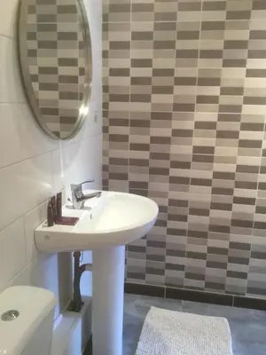 Salle de bains dans l'établissement Auberge Henri IV