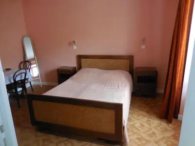 Un ou plusieurs lits dans un hébergement de l'établissement Hotel Magne