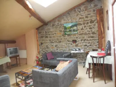 Télévision ou salle de divertissement dans l'établissement Hotel Magne