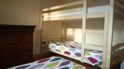 Un ou plusieurs lits dans un hébergement de l'établissement Naturessime Eco Village&Spa