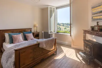 Un ou plusieurs lits dans un hébergement de l'établissement Bellevue appartement