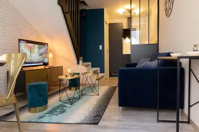 Coin salon dans l'établissement Maison de centre ville