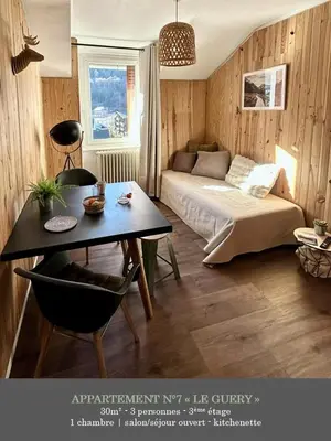 Un ou plusieurs lits dans un hébergement de l'établissement La Maison des Familles 10 appartements