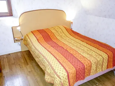 Un ou plusieurs lits dans un hébergement de l'établissement Holiday Home Maison Bonneval by Interhome