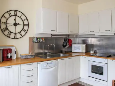 Cuisine ou kitchenette dans l'établissement Holiday Home Passerat by Interhome