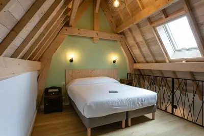 Un ou plusieurs lits dans un hébergement de l'établissement LE PETIT MOULIN
