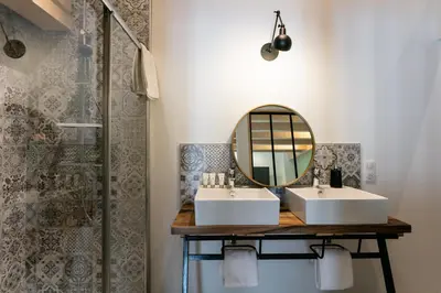 Salle de bains dans l'établissement LE PETIT MOULIN