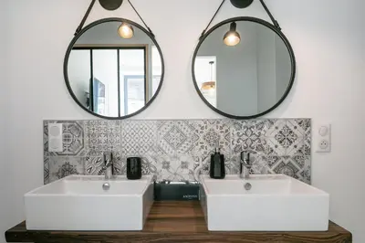 Salle de bains dans l'établissement LE PETIT MOULIN