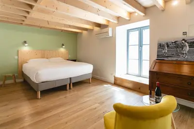 Un ou plusieurs lits dans un hébergement de l'établissement LE PETIT MOULIN
