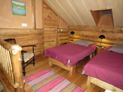 Un ou plusieurs lits dans un hébergement de l'établissement La cabane de Hans
