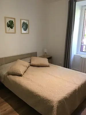Un ou plusieurs lits dans un hébergement de l'établissement Magnifique T4 avec terrasse à Saint-Nectaire - 8 pers