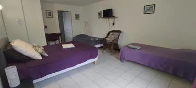 Un ou plusieurs lits dans un hébergement de l'établissement MOULIN DE LACHAUD - HOTEL et GITES