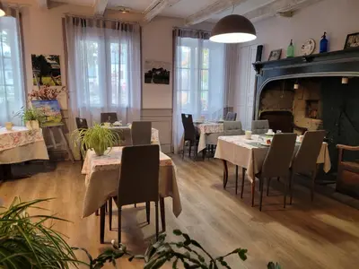 Coin salon dans l'établissement Hotel Fouillade